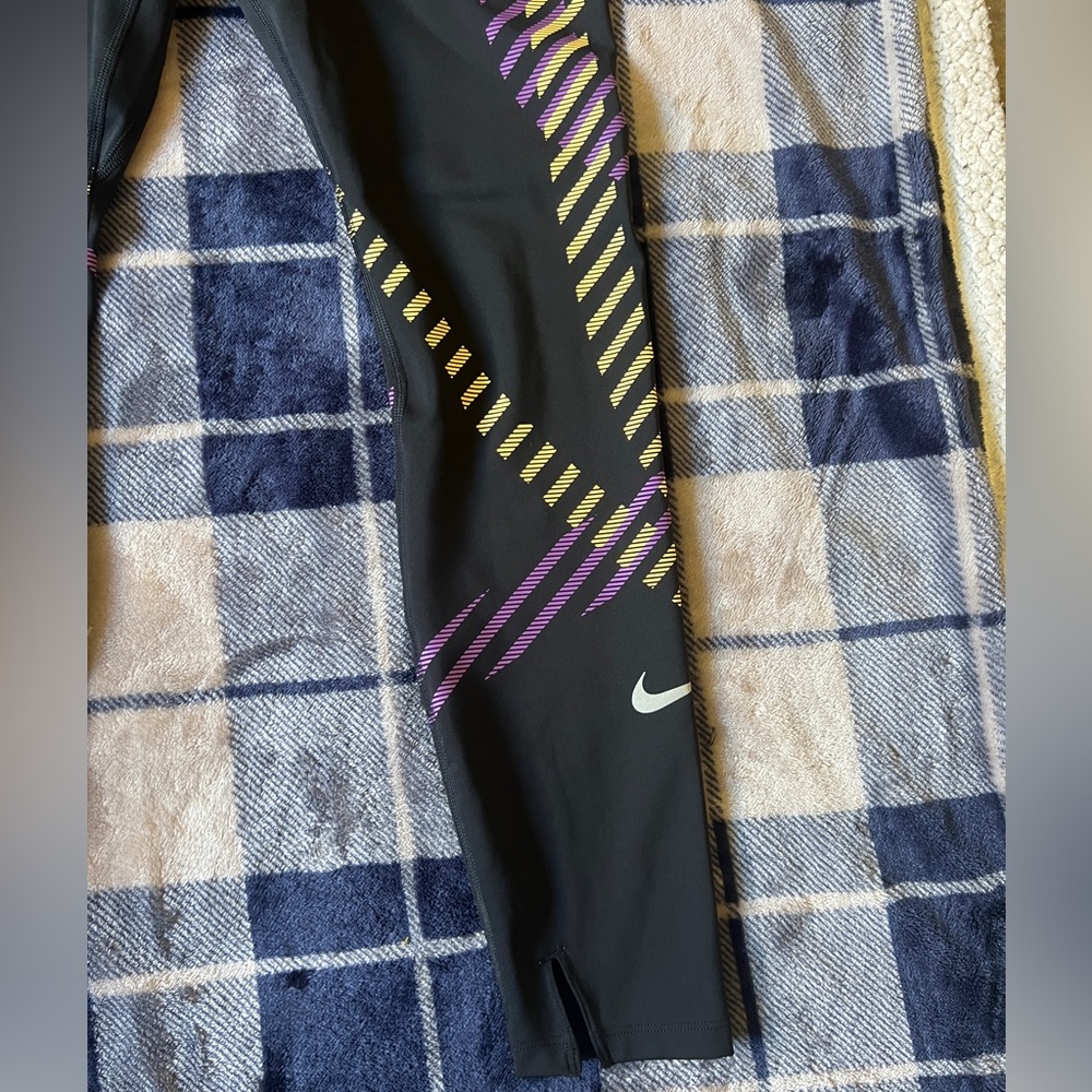 Nike Black Leggings with Purple and Yellow Diagonal Stripe Accents - Picture 2 of 10